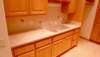 corianlikecolorsolidsurfacekitchencountertopswithtowelbarbyquarrystone170_small.jpg