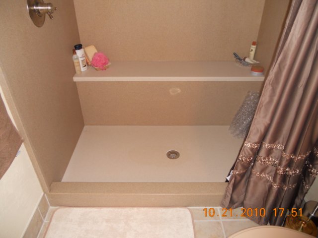 solidsurfaceshowerbaseandbench.jpg