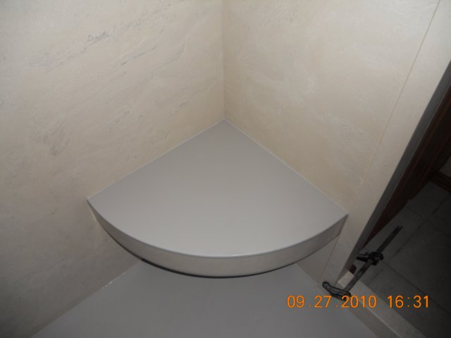 solidsurfaceshowerradiuscornerseat.jpg