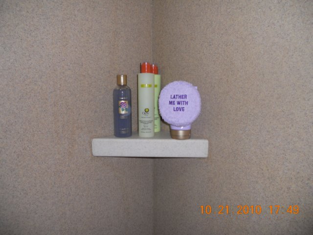 solidsurfaceshowershelf.jpg