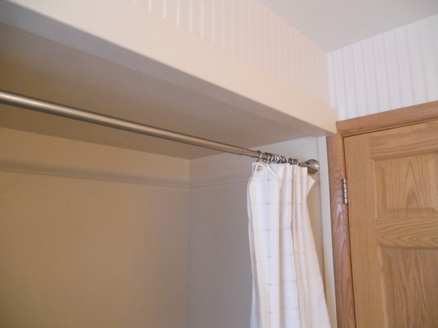 solidsurfaceshowerwallceilingandtrimpanels.jpg