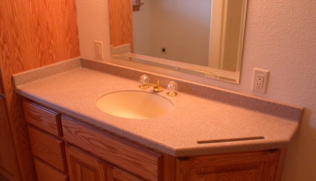 corianlikequarrystonesolidsurfacebathroomcountertopstowelbar144.jpg