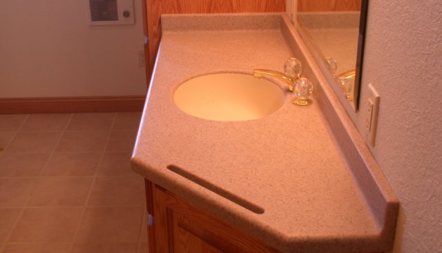 corianlikesolidsurfacebathroomcountertopstowelbarquarrystone145.jpg