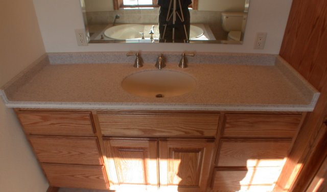 coriansolidsurfacekitchencountertopsquarrystone142.jpg