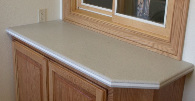 corianlikesolidsurfacekitchencountertopsquarrystone139.jpg