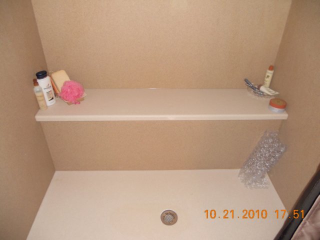 solidsurfaceshowerbenchseat.jpg