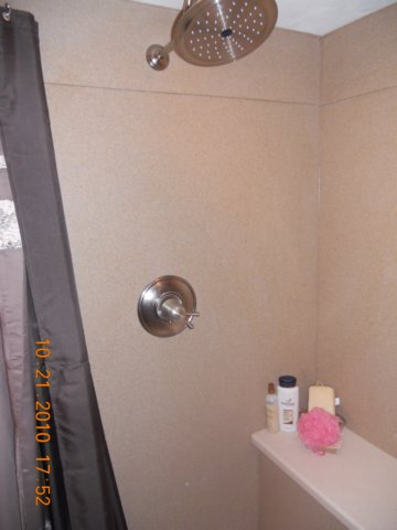 solidsurfaceshowerplumbing.jpg